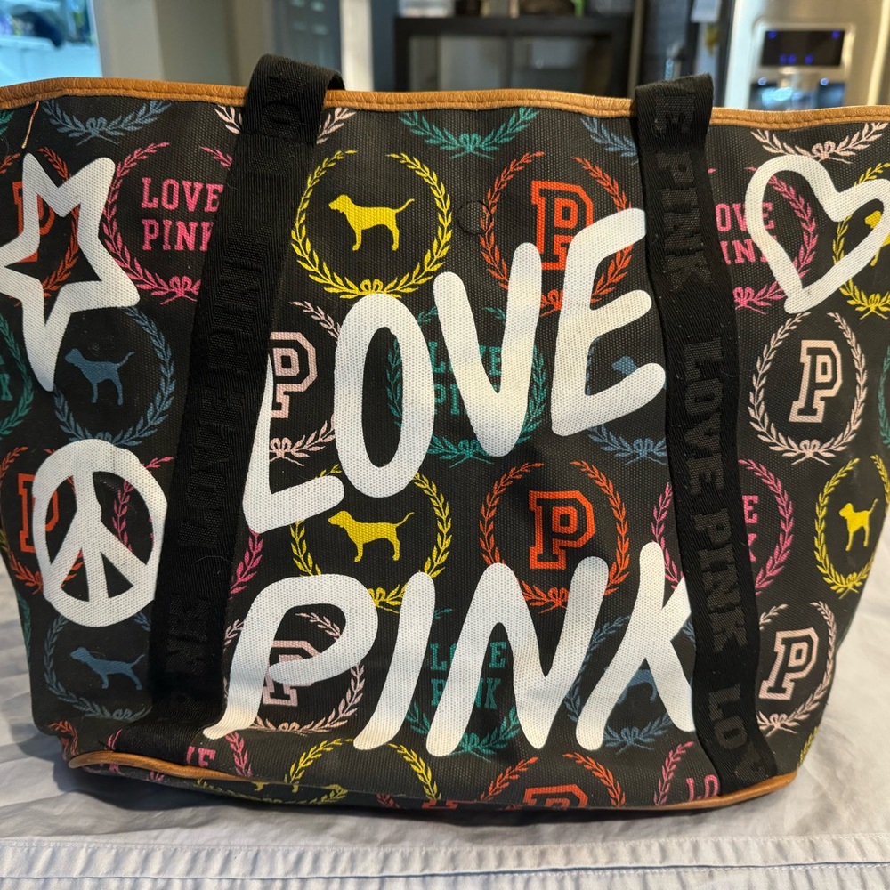 VS PINK travel bag - black canvas with Love PINK graffiti lettering